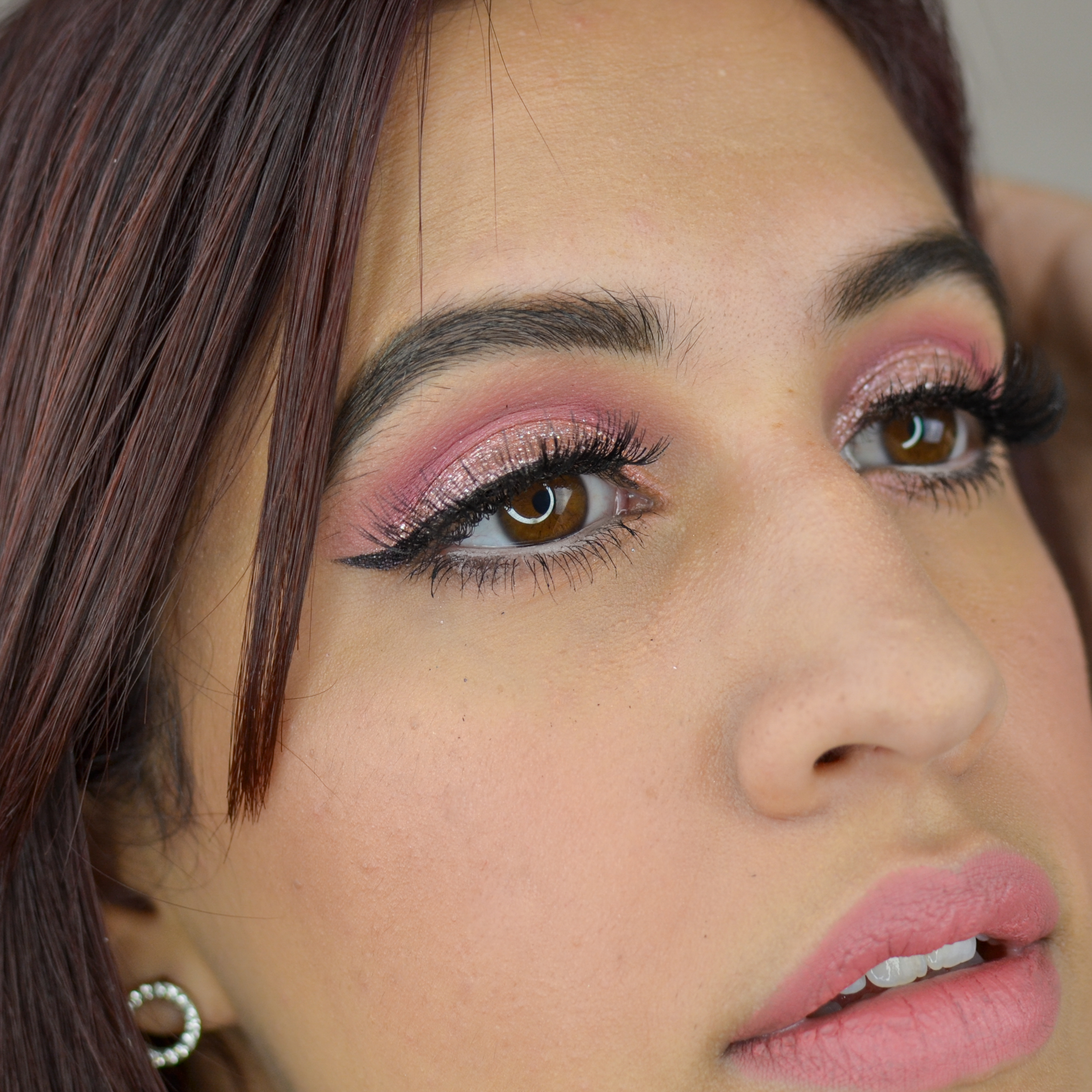 Pink eye makeup for prom, pink dress, or birthday. It is a simple pink eyeshadow look.
